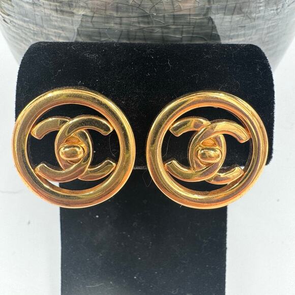 CHANEL Jewelry - Chanel Vintage Encircled Turnlock Earrings 97P 24k Gold Plated Clip On